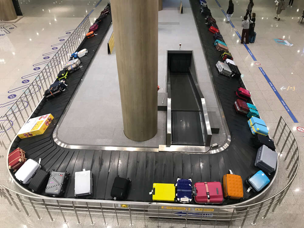 Suitcase on luggage conveyor